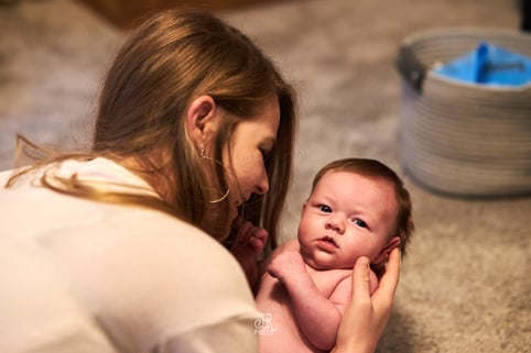 Mom lovingly looking at her baby