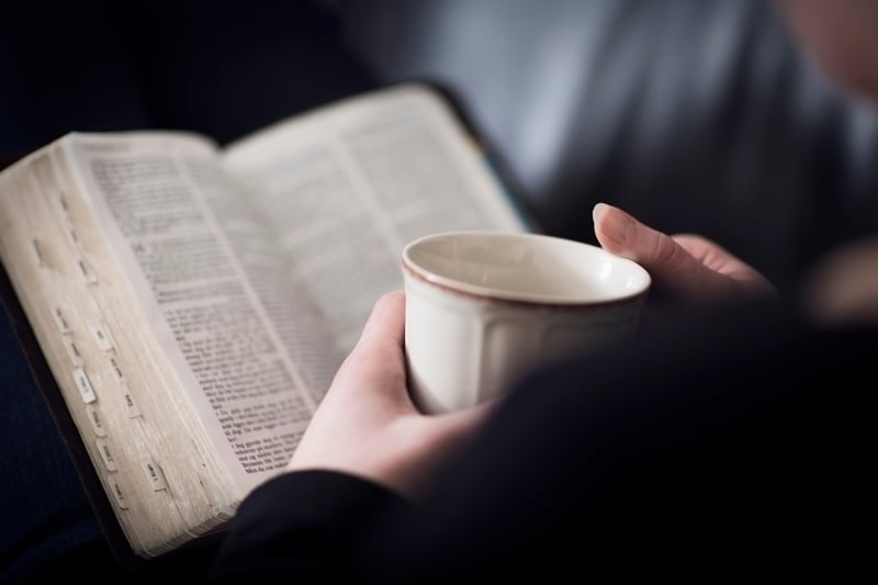 CHM - Woman reading devotionals.